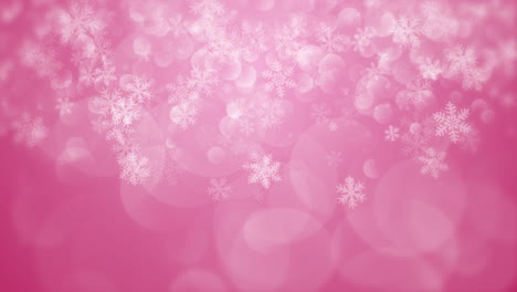 loop christmas animation with snowflakes on pink background. sweet pink christmas copy space.