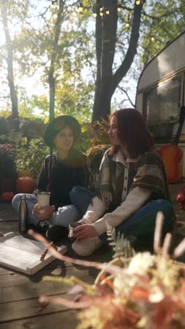 two friends enjoying an autumn picnic