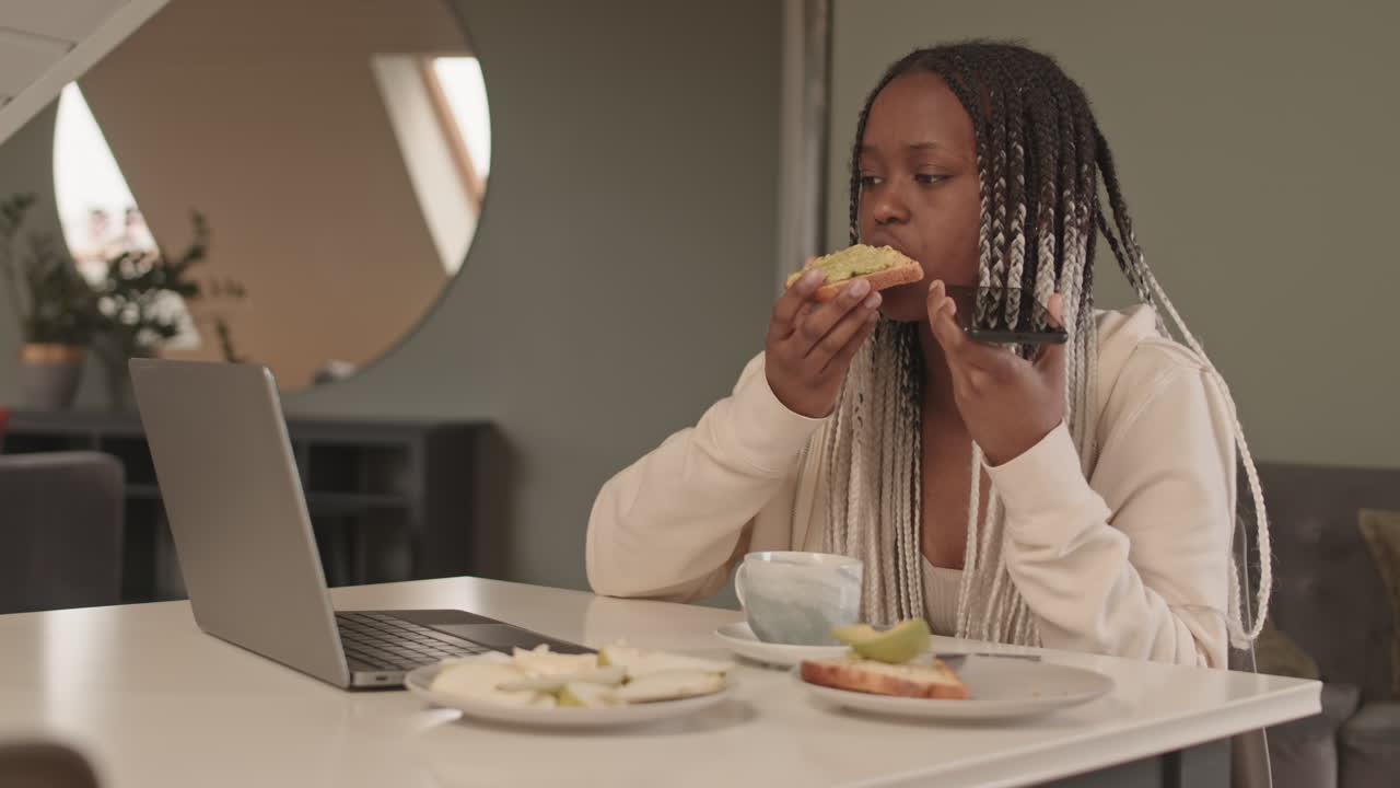 African American Woman Having Breakfast at Home