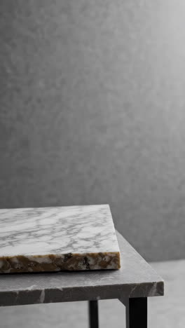 Elegant Marble Table Top Display Against a Gray Wall