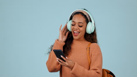 Student,-phone-and-a-woman-listening-to-music