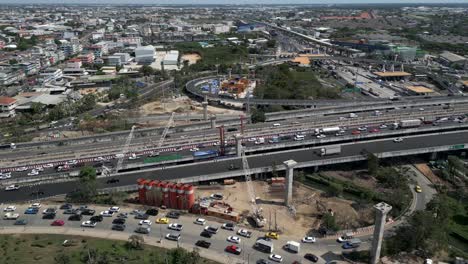 aerial view of a major highway and expressway construction project in an urban area