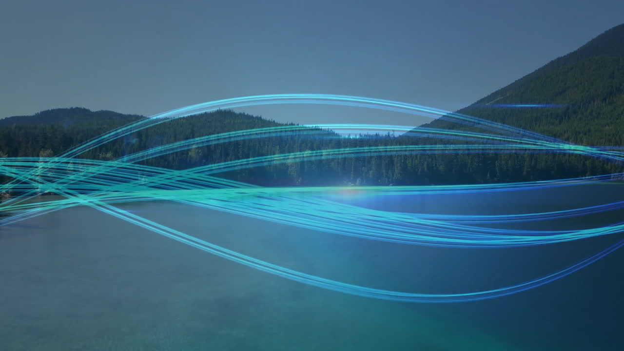 Animation of blue light trails forming network over lake and mountain landscape