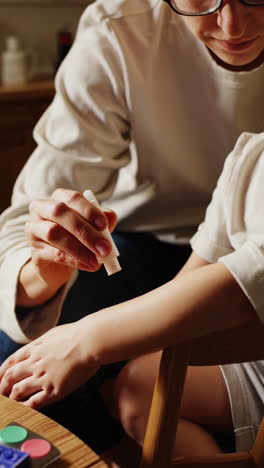 applying cream to a child's arm
