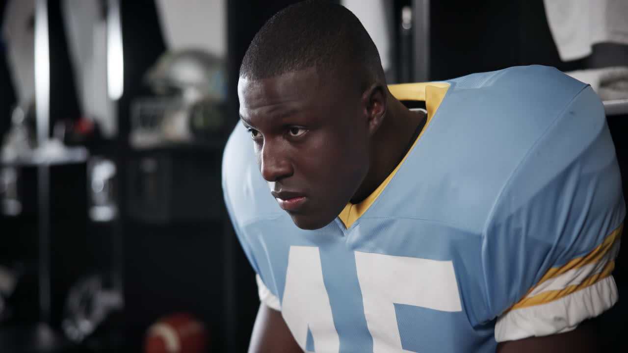 Football player in locker room