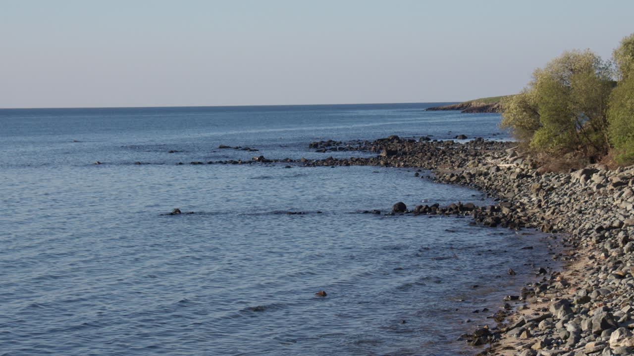 Wide shot of rocks Exposed at low tide at Pen-y-chain, Pwllheli