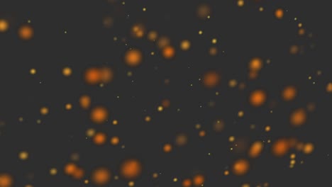 bokeh gris oscuro fondo de ensueño con amarillo naranja brillante círculo brillante que se acercan