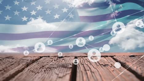 Animation-of-connected-profile-icons-over-flag-of-america,-clouds-and-wooden-table