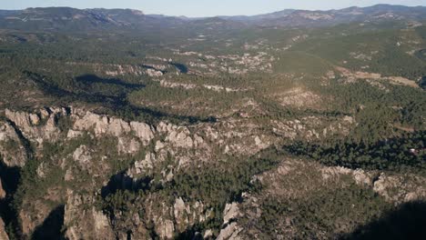 Natural-environment-drone-landscape-of-Copper-Canyon-Mexican-Mountains-Skyline-of-Green-trees-and-rocky-range-formation,-Mexico-Chihuahua-Sierra-Madre-Occidental,-Travel-Trek-Spot