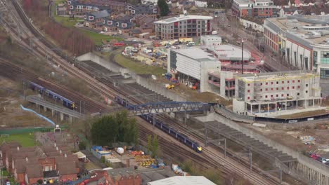 aerial view of hs1 leaving ashford international train station, ashford, kent, uk