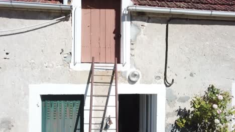 Old-ladder-on-a-rural-house.-Drone-shot