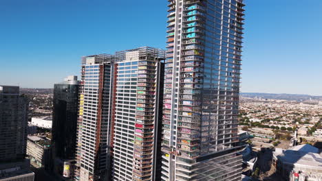 Aerial-View-of-tagged-High-Rises-in-Los-Angeles-with-graffiti-covering-buildings