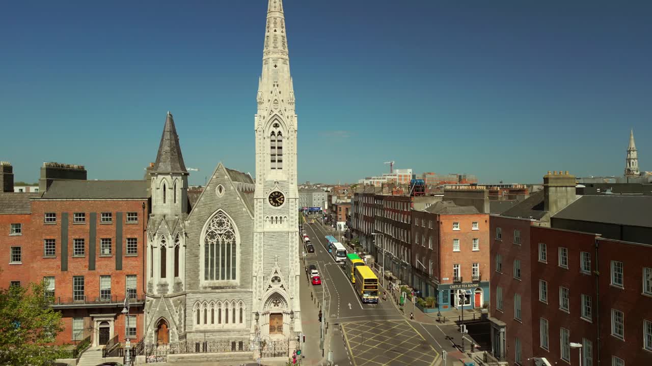 Rising aerial video of Abbey Presbyterian Church and the surrounding area in Dublin City Centre, Ireland on a bright and sunny day. Filmed in 4K, 60FPS and with Rec709 color.