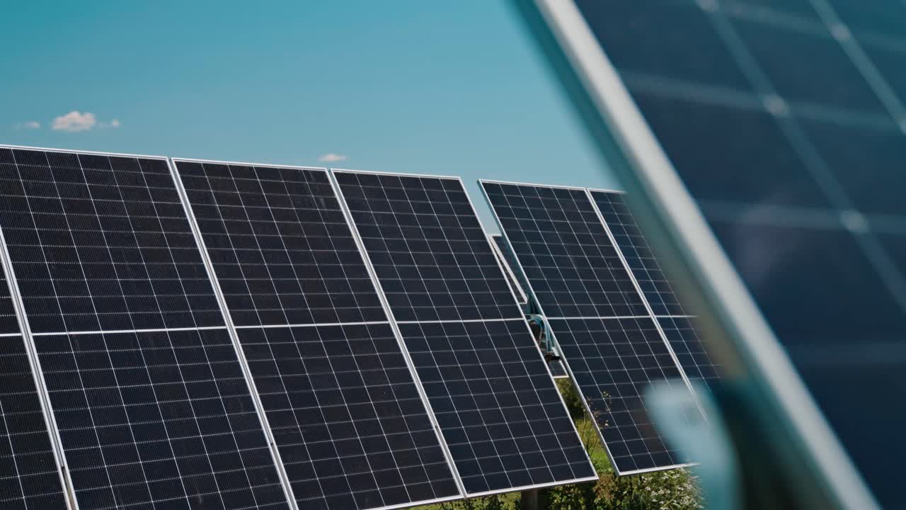 Close-up of solar panels in sunlight, showcasing renewable energy concept
