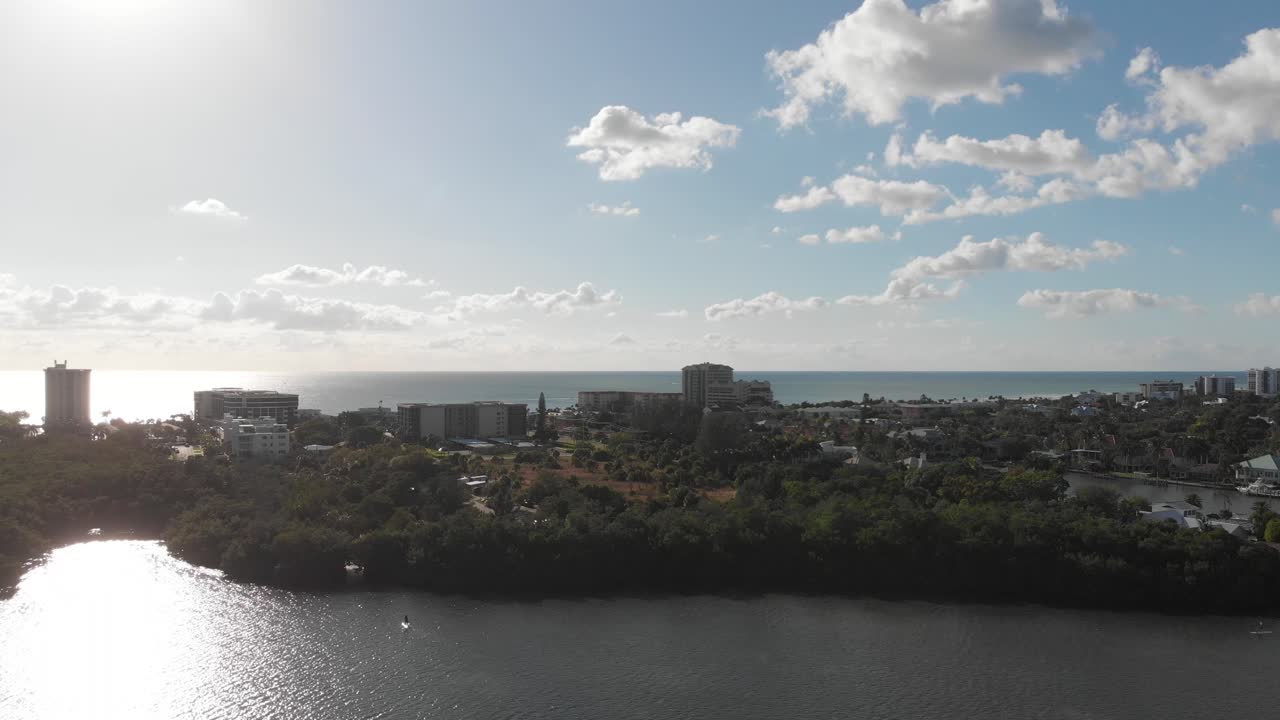 Aerial View of Coastal City with Ocean and Buildings