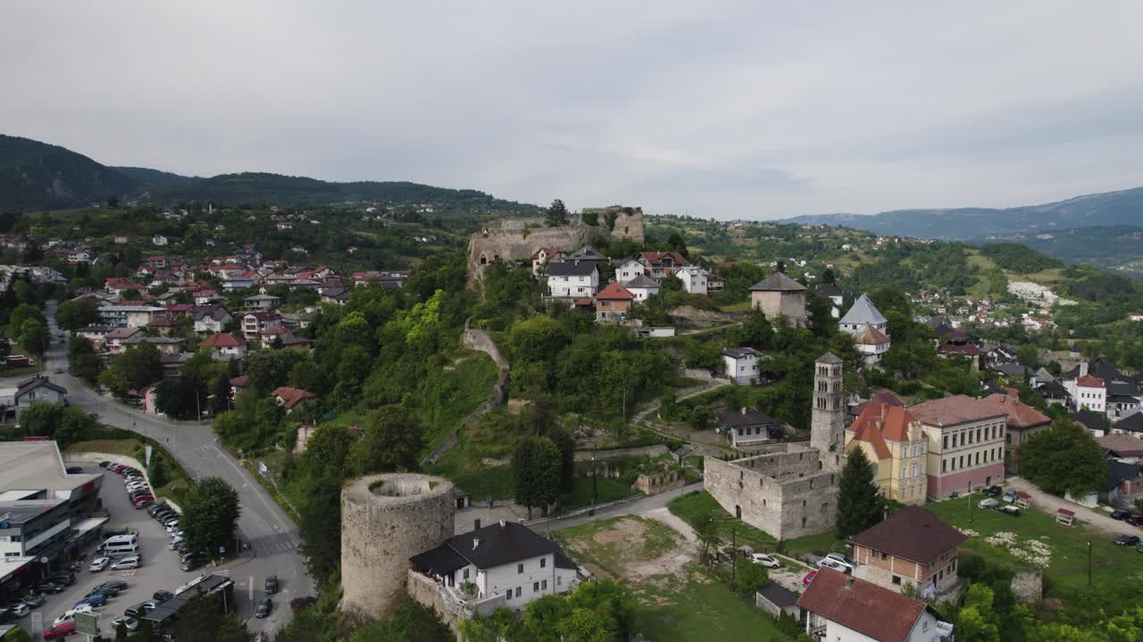 Jajce's Citadel Amidst Town and Hills, Aerial wide view