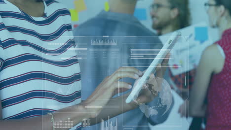 person using tablet with data analytics animation over diverse group in office