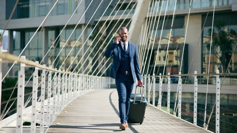 businessman walking on a bridge, talking on the phone