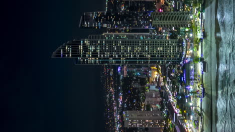 aerial vertical video tracking along surfer's paradise's skyline, gold coast, australia