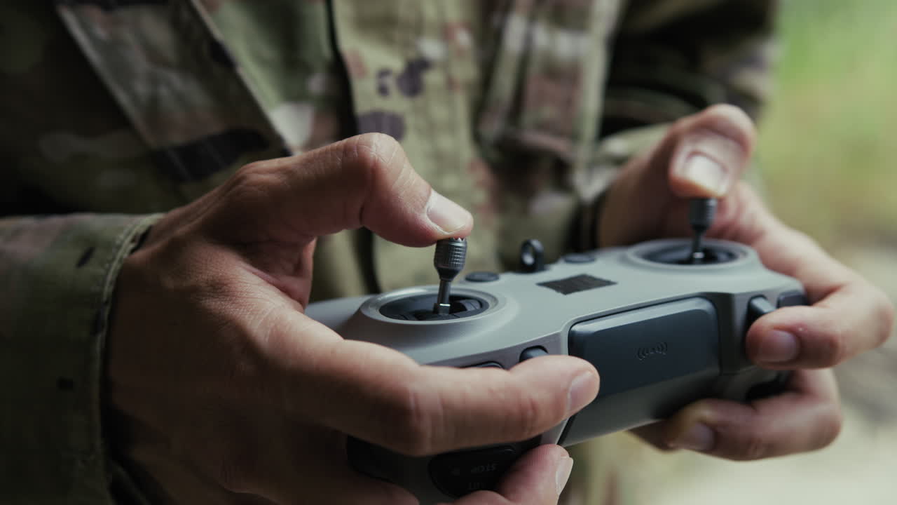 Ukrainian Drone Pilot Prepares to Bomb Military War Target