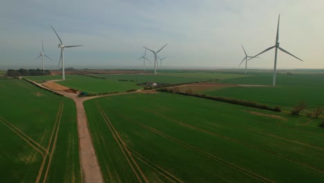 Aerial-drone-sideways-view-of-Lissett-Airfield-wind-farm-in-Yorkshire,-UK