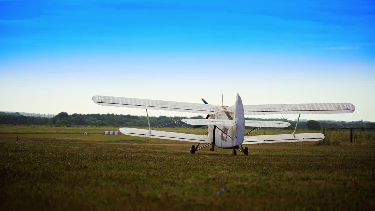 Vintage Biplane on a Field
