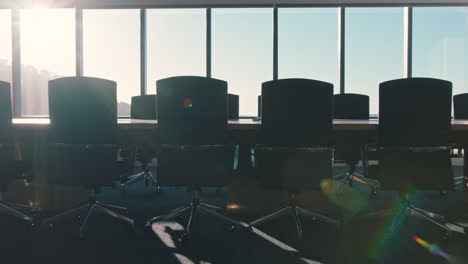 empty-corporate-office-boardroom-modern-conference-room-with-view-of-urban-city-at-sunset-4k-footage