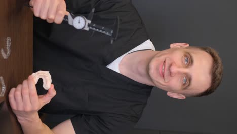 portrait of a surgeon with a caliper in his hands. plastic surgery concept. 4k video