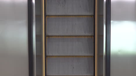 top down view of an empty running escalator