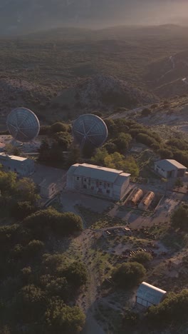 aerial view of abandoned satellite station at sunset