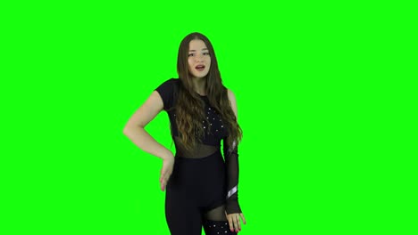 stunning female model acting in front of a green screen