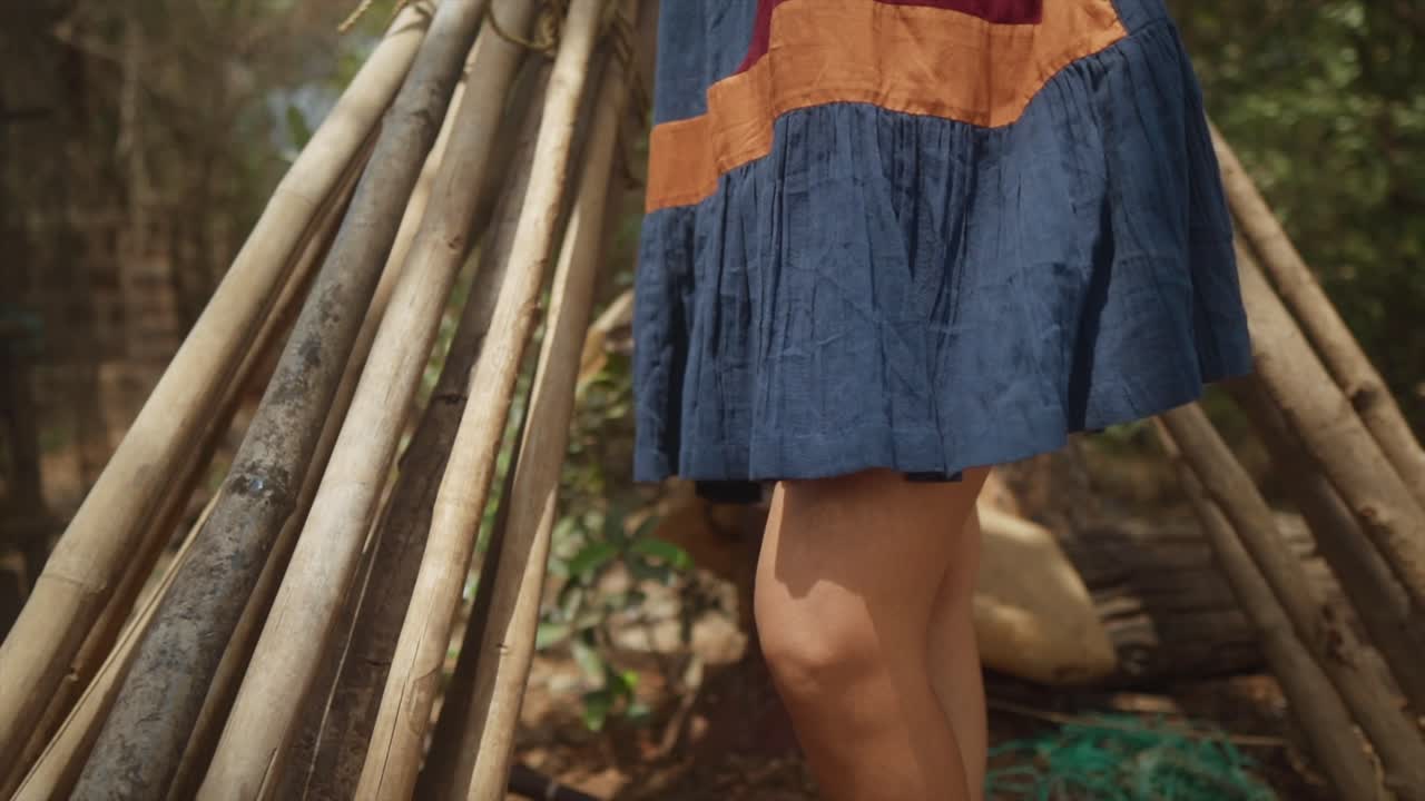 Slow motion shot of a woman's dress just above her knee