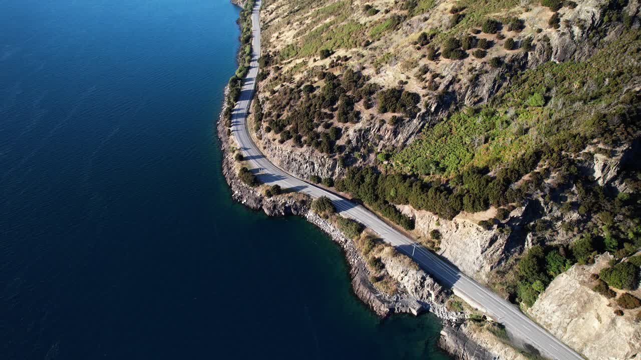 Scenic Aerial View Highway Road With Lake Hawea And Mountains In Otago Region, South Island, New Zealand. Aerial Drone Shot