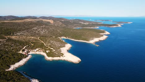 an aerial shot of the beach stiniva cove beach of adriatic sea, vis island,dalmatia, croatia