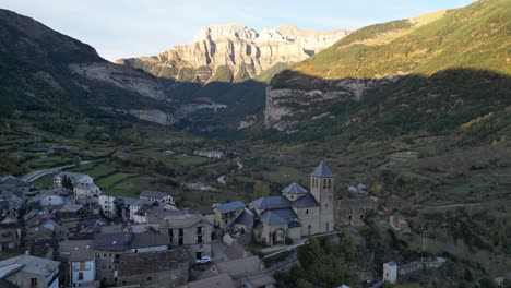 torla mountain village in ordesa y monte perdido national park, pyrenees, north spain - aerial 4k