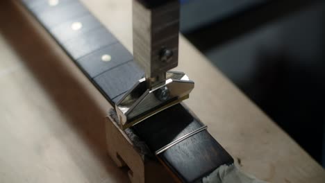 guitar neck press in action