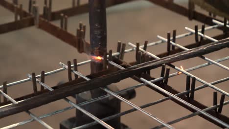 Close-Up-Of-Spot-Welding-Tip-Fusing-Reinforcement-Wire-Mesh-Frame