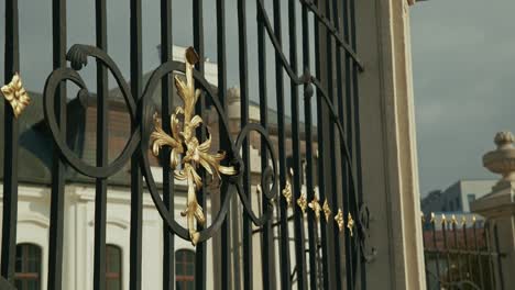 close up of an ornate black and gold gate in bratislava slovakia