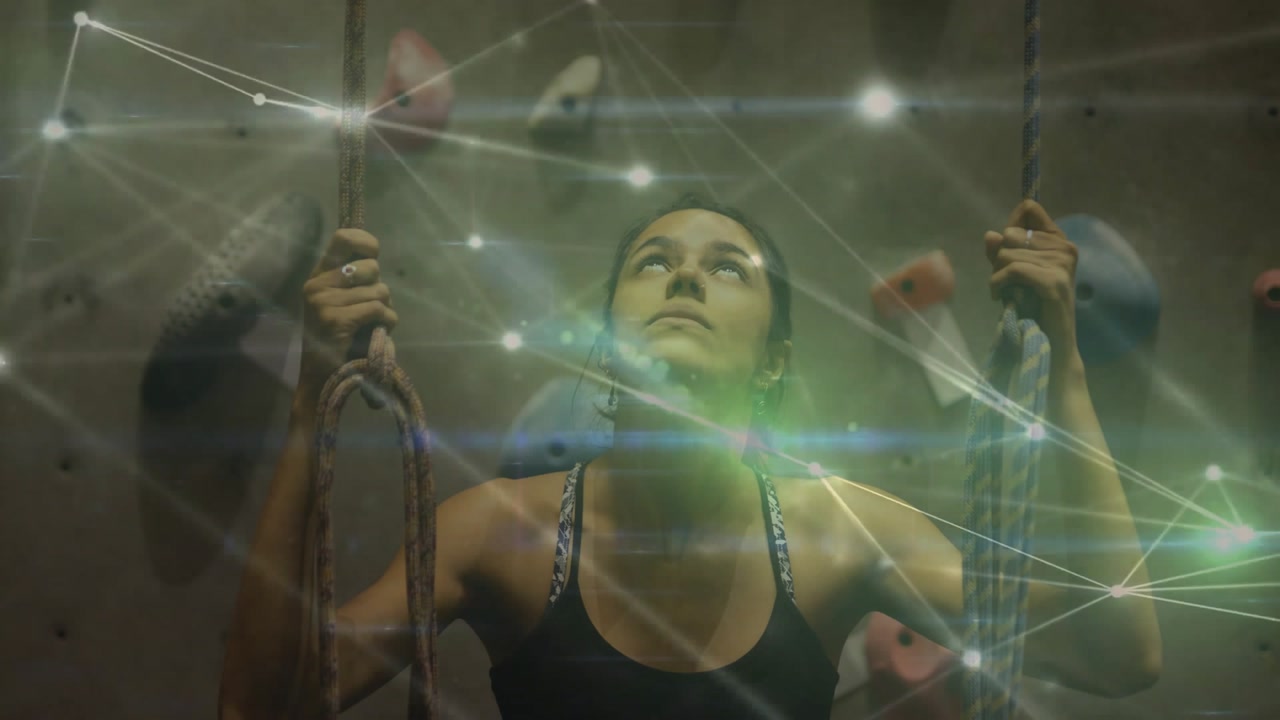 Tech network overlay emerging around woman initiating rope gripping while mapping holds for ascent