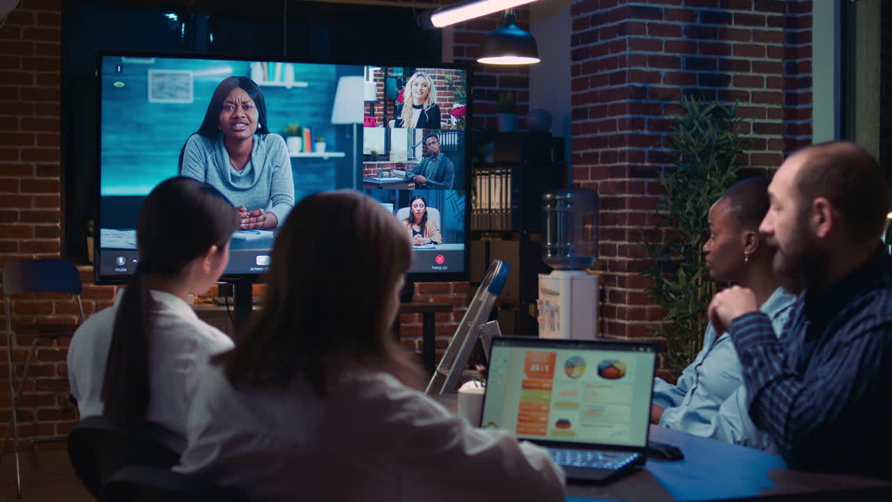 Remote team business meeting, coworkers talking in videocall