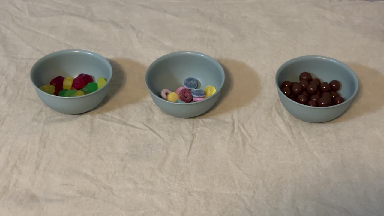 Sweets and chocolates served in 3 bowls in a suburban home in Cape Town.