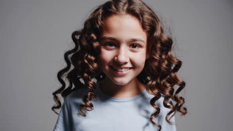 happy girl with curly hair