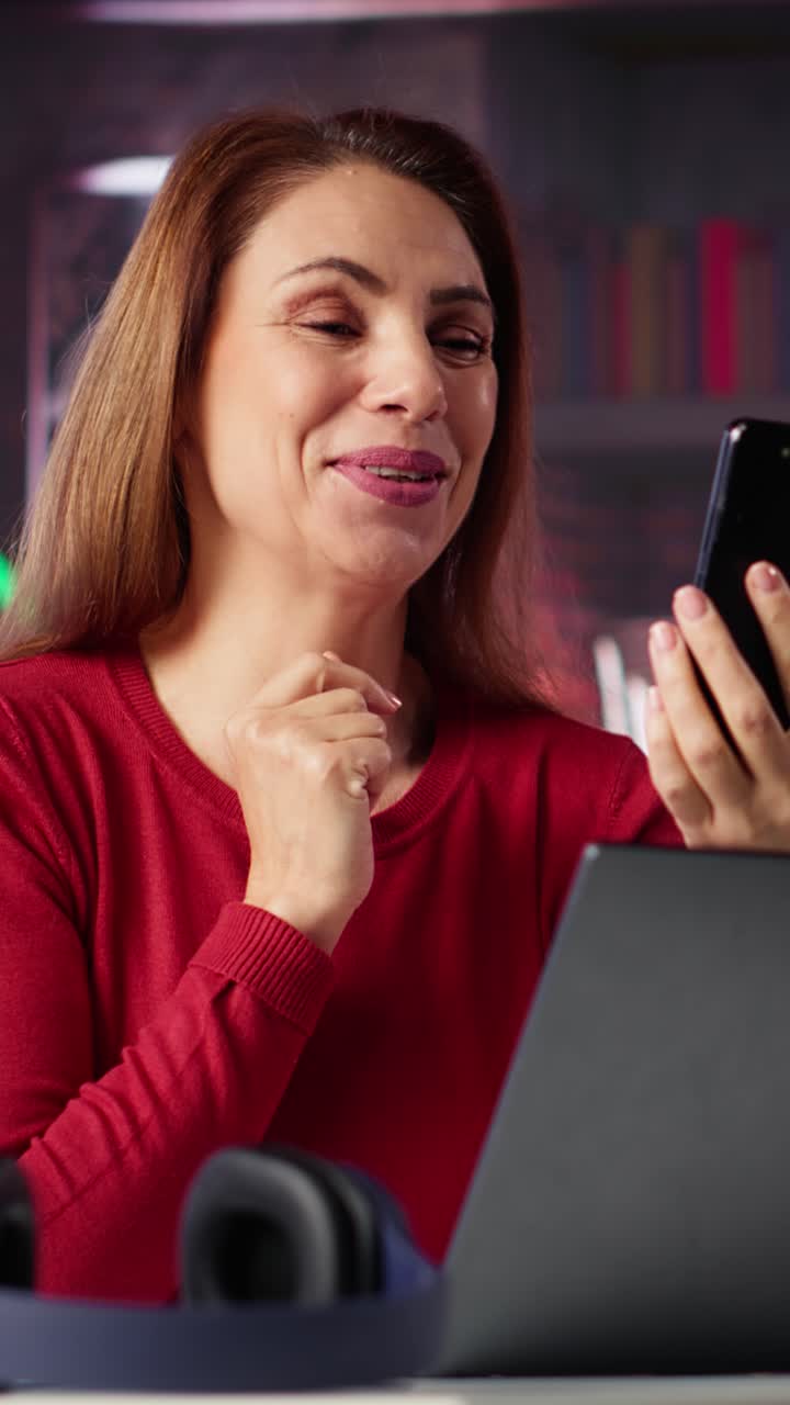 Vertical Video Woman freelancer taking online course to develop new skills from home office