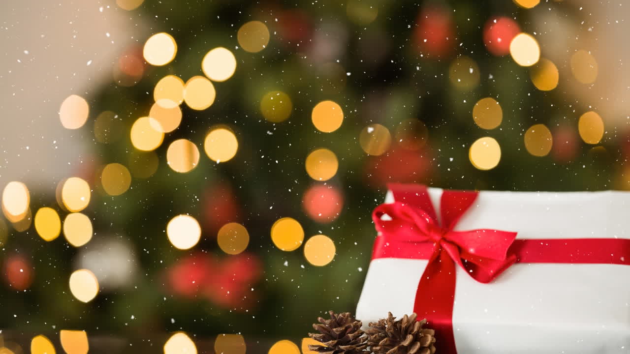 caída de nieve y regalo de navidad con luces