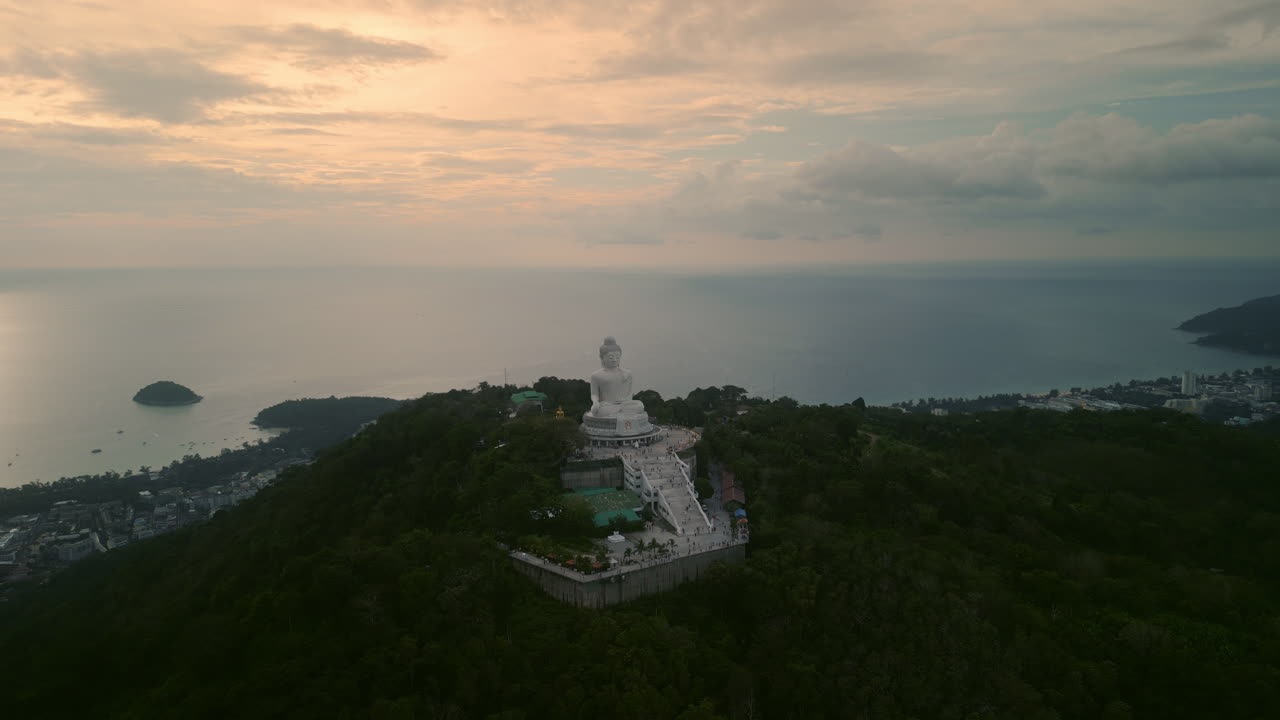 Big Buddha Statue at Sunset over the Ocean