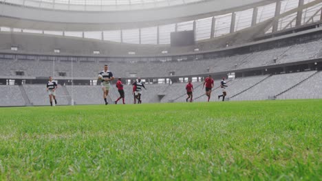 rugby players playing rugby match in stadium 4k