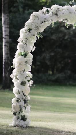 Place-for-bridal-ceremony-against-the-background-of-park-garden-backyard