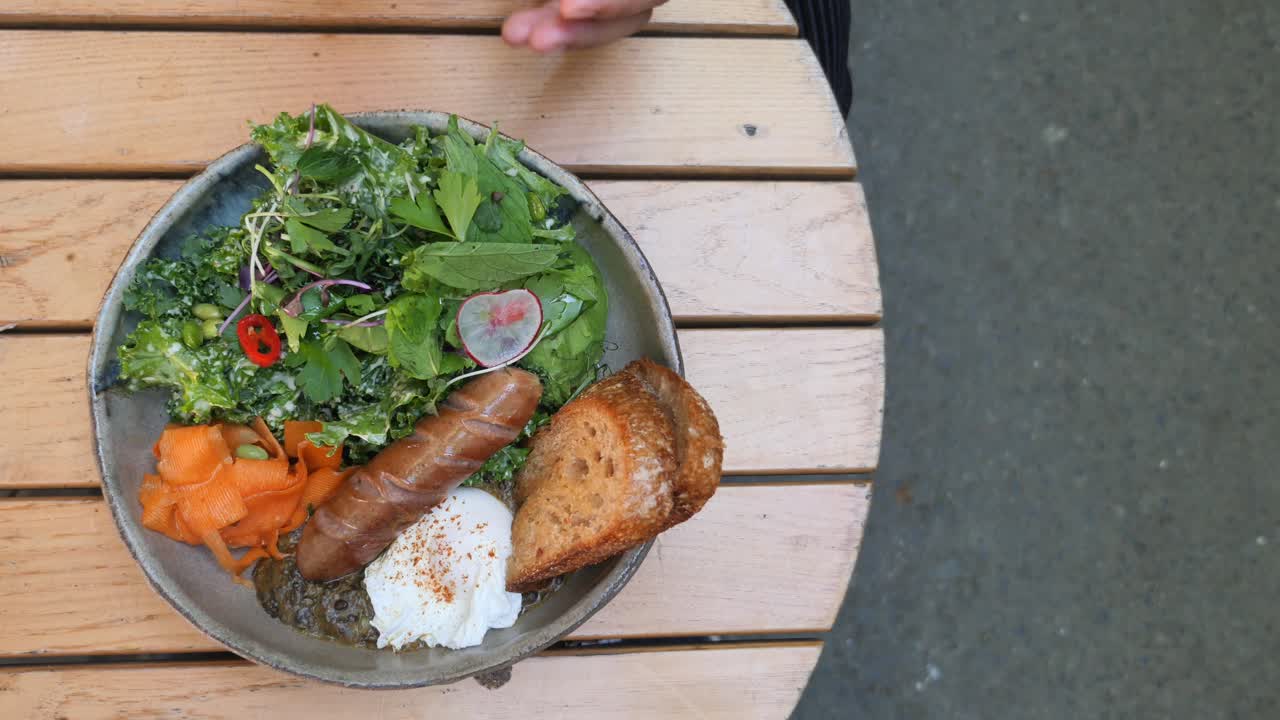 Salad with Sausage and Poached Egg