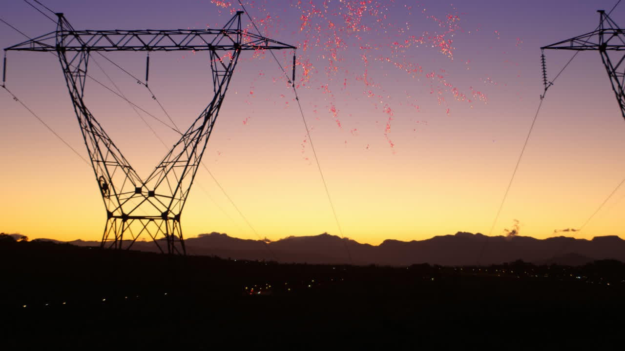 Transmission towers with fireworks