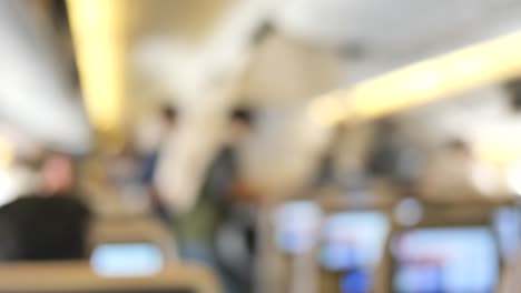 Blue-view-of-empty-passenger-airplane-seats-in-the-cabin,